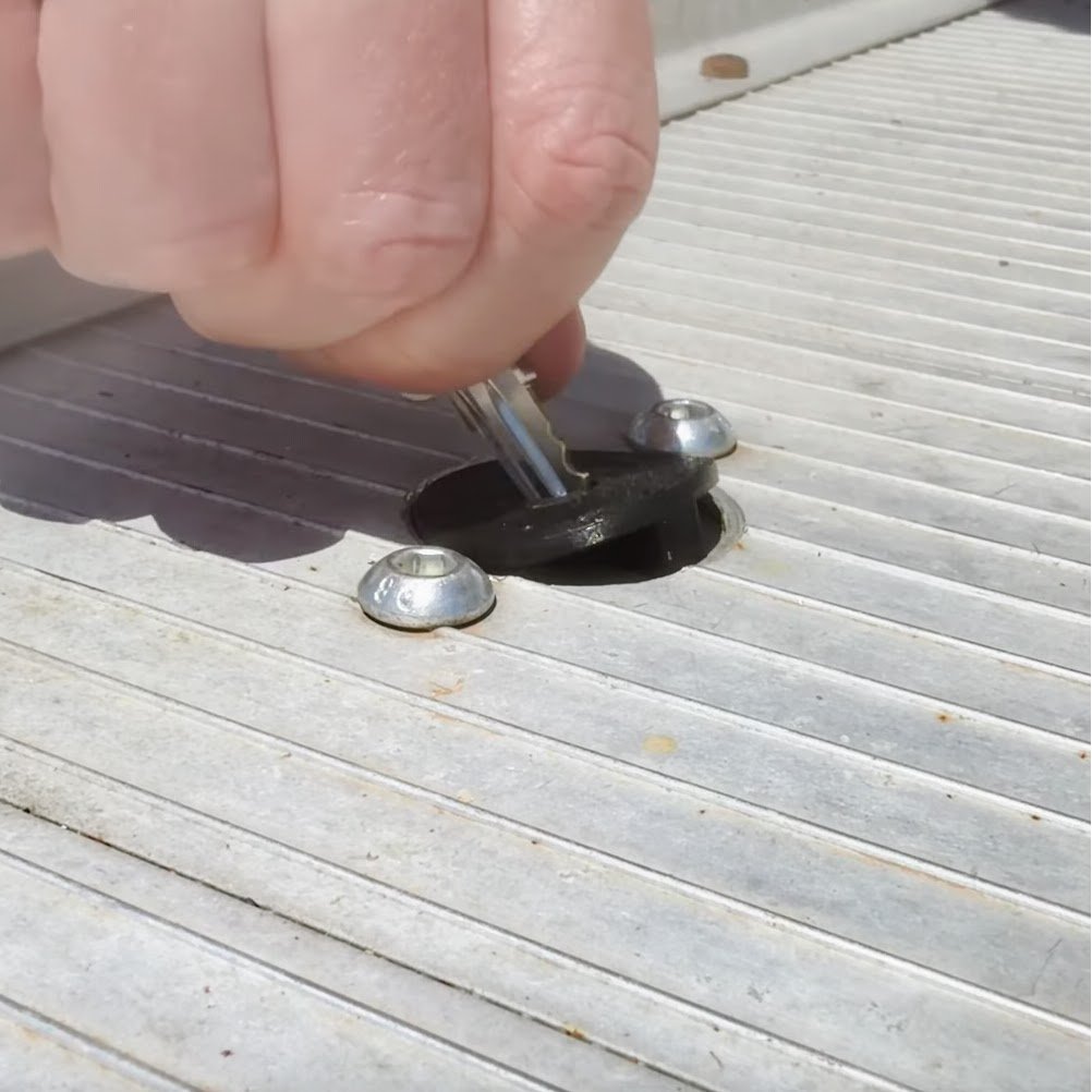 Removing a TurnLock receiver cover with a key