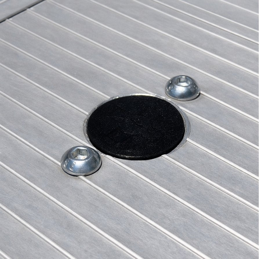 TurnLock receiver cover fitted flush in a ute tray floor